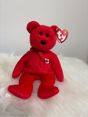 Ty(72) (Pierre) Vintage “Retired” Beanie Baby with Maple Leaf